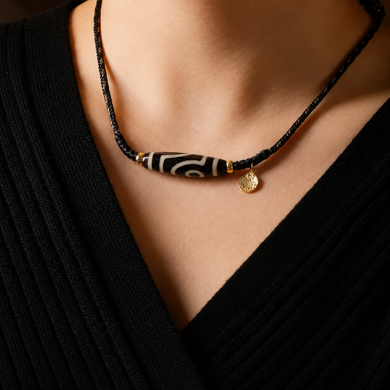 Dzi bead necklace worn near the heart as wearable Himalayan art