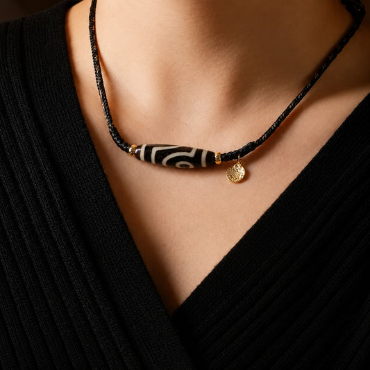 Dzi bead necklace worn near the heart as wearable Himalayan art