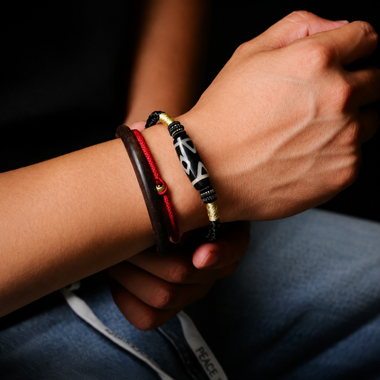 Dzi bead bracelet carried on the wrist as symbolic jewelry